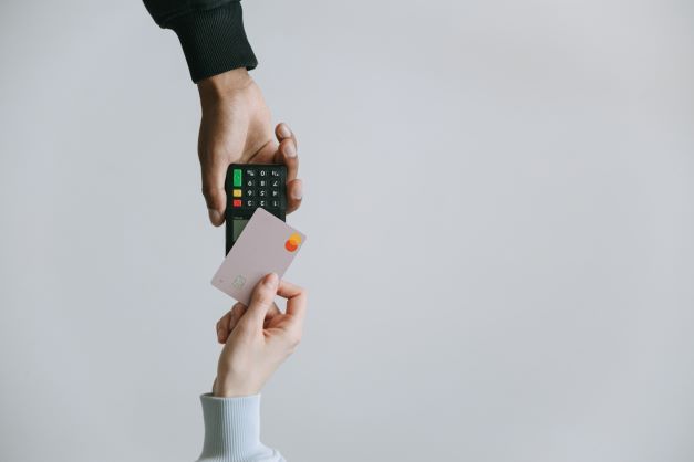 Credit card tapped on a payment terminal