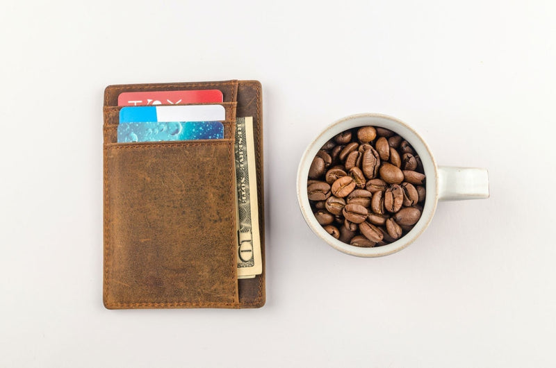 Wallet with credit cards, cash and coffee
