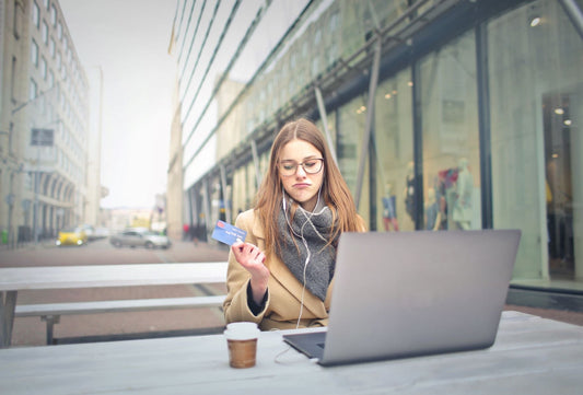 Woman holding a credit card
